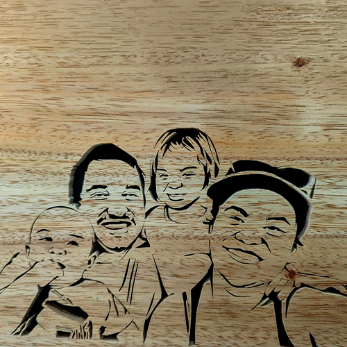 Custom wooden family portrait with 4 faces, including babies. Handcrafted from your photo for a unique keepsake