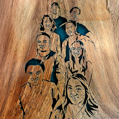 Custom wooden group portrait with 9 faces. Handcrafted wood carving from a family or memorial photo