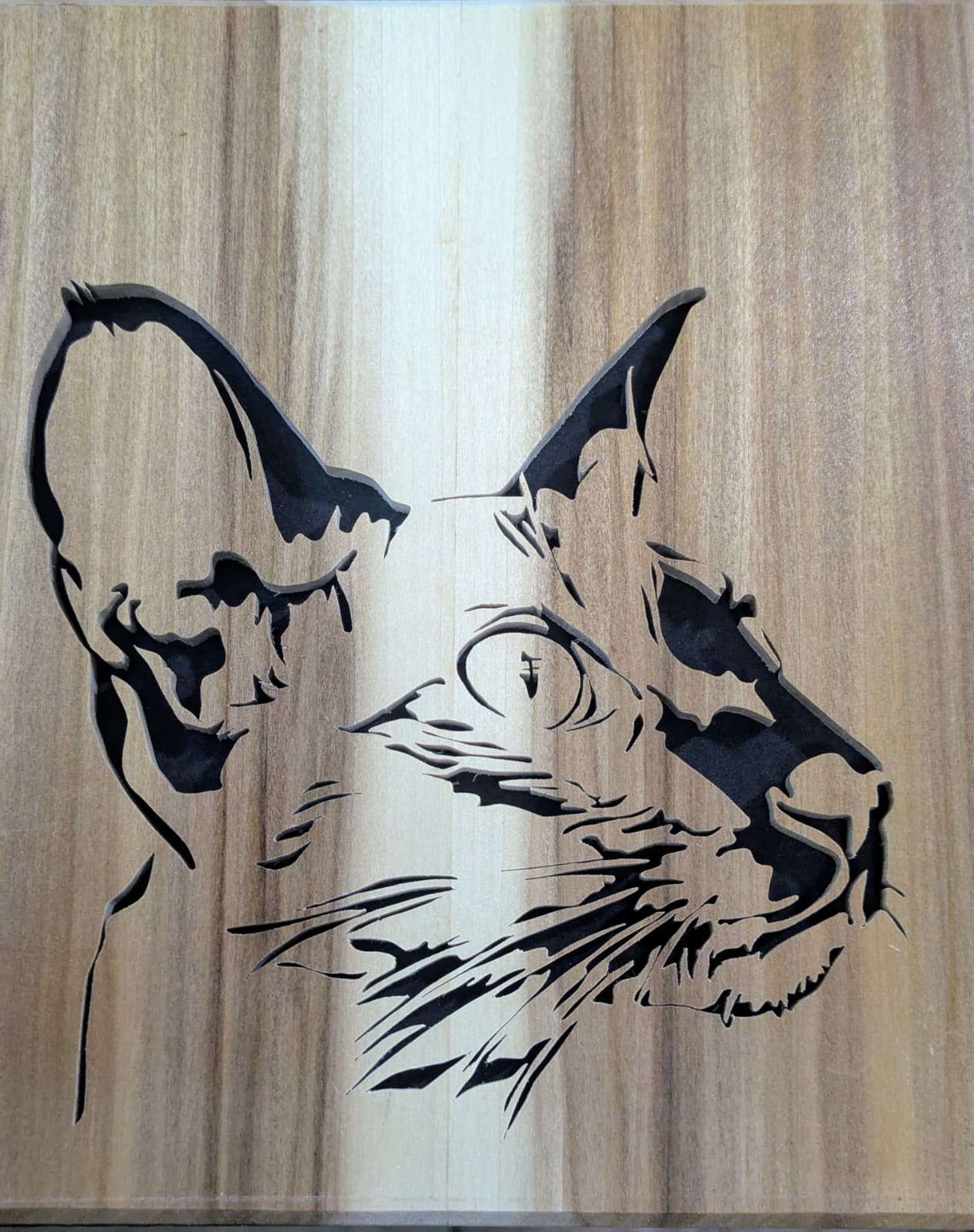 Custom wooden portrait of a cat from a photo. Personalized pet carving, handmade with care.