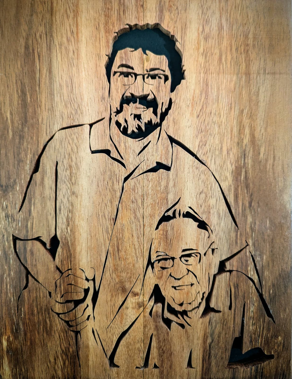 Custom wooden portrait of two men from a family photo. Handcrafted wood art for gifts or memorials.