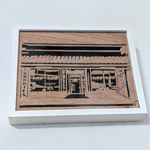 Custom wooden storefront portrait of a sundries shop. Handcrafted facade carving from photo